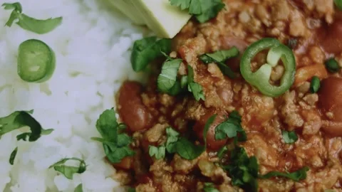 Delicate kitchen study of restaurant-style chili con carne beauty shot Stock Footage 342153597
