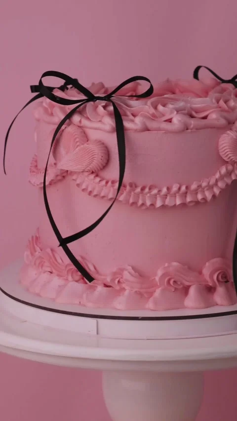 Delicate lambeth style cake with pink cream cheese frosting Stock Footage 306918838