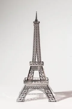 Delicate metal Eiffel Tower model on white background Foto stock