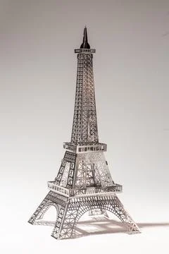 Delicate metal Eiffel Tower model on white background Foto stock