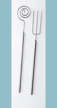 Delicate metal serving utensils Stock Photos