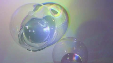 Delicate orbs move in slow patterns, bending light in every direction. Stock Footage 302942994