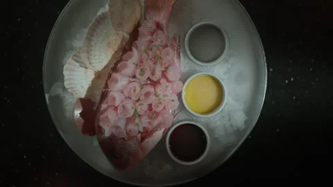 Delicate Sashimi Rose on Fresh Red Snapper Stock Footage 315958045