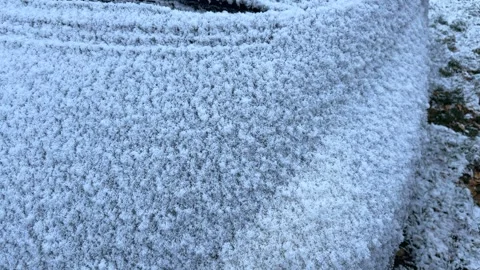 Delicate snow covering a car – texture of fluffy snow Stock Footage 301087870