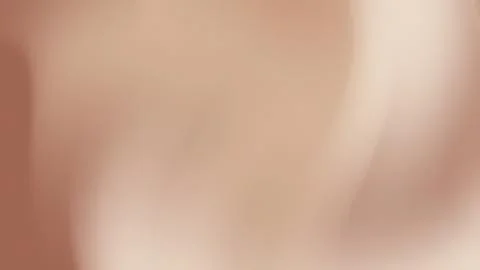 Delicate, soft gradient of muted beige and taupe tones. Stock Photos