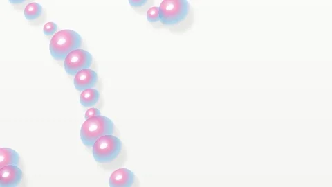 A delicate string of iridescent pink pearls against a clean white background Stock Footage 339618682