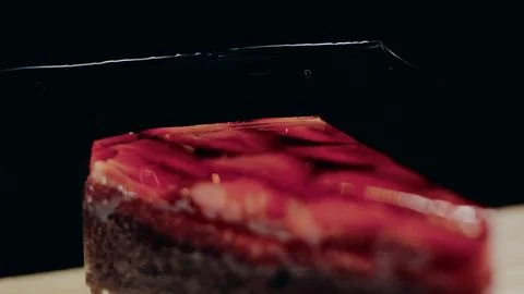 Delicate sweet serving view: showing a strawberry jelly cake slice Stock Photos