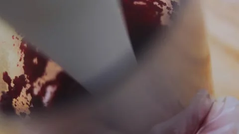 Delicate tabletop moment: kneading vivid red beet dough Stock Footage 342173431