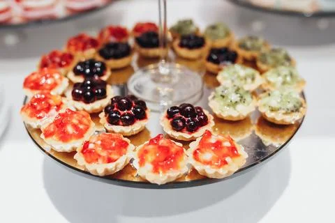 Delicate tarts arranged in a circular pattern Stock Photos