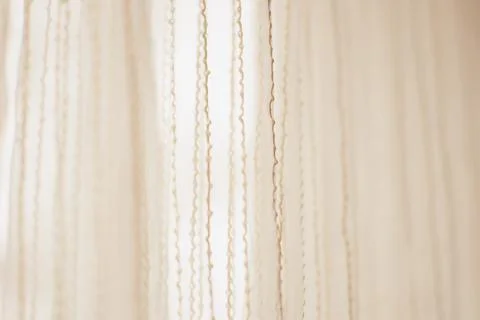 Delicate tulle with vertical threads pattern, side view 스톡 사진