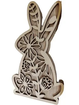 Delicate wooden Easter bunny cutout with intricate floral patterns, perfect.. 写真素材