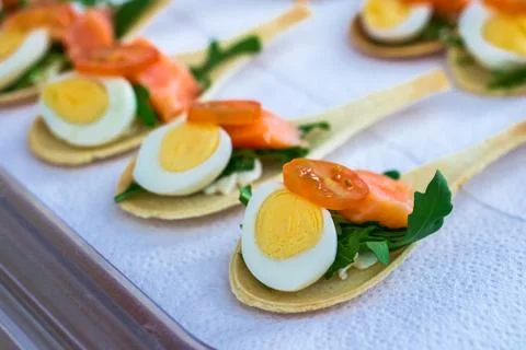 Delicates, appetizer filling with red fish and greens. Catring service. Stock Photos