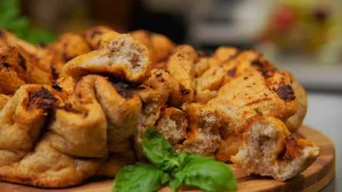 Delicious and crispy tomato bread lies on a cutting board Stock Footage 252218252