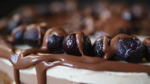Delicious and decadent layered cheesecake dessert topped with fresh blueberries Stock Footage 166363477