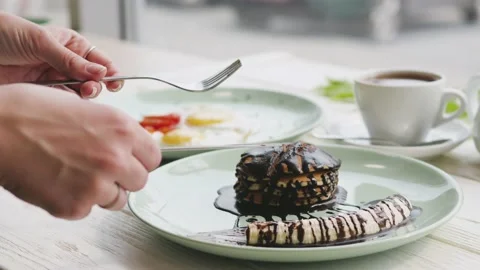 Delicious and healthy breakfast. breakfast of fried eggs, dessert and tea 動画素材 140077765
