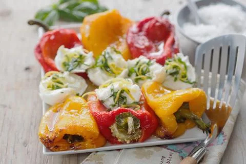 Delicious and healthy organic stuffed red and yellow peppers Stock Photos