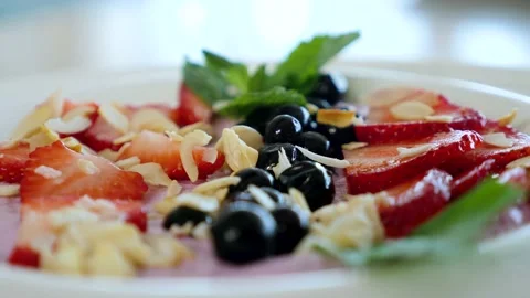 Delicious and quick breakfast with different summer berries and healthy cottage  Stock Footage 239925598