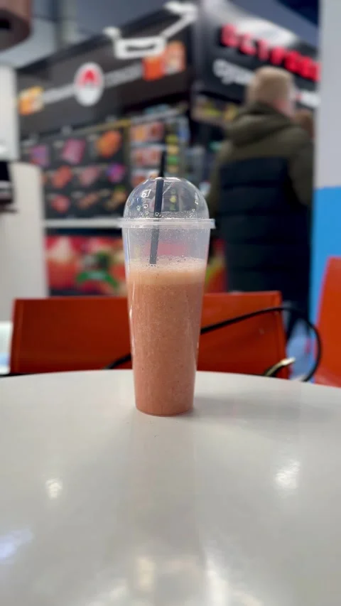 A Delicious and Refreshing Fruit Smoothie Served in a Clear Cup for Full Stock Footage 316470401