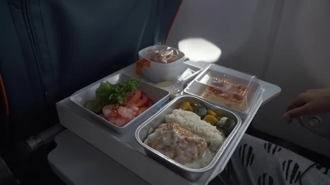 Delicious and varied dinner on board aircraft stock footage video Stock Footage 80360601
