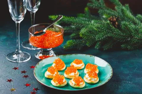Delicious appetizer with red caviar. Stock Photos
