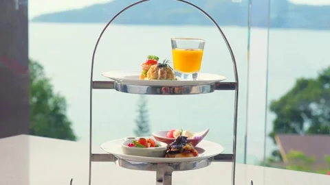 Delicious appetizers served on white plate in luxury restaurant Vídeos de archivo 243592455