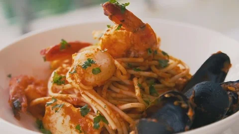 Delicious appetizing spaghetti on a plate Stock Footage 73794050