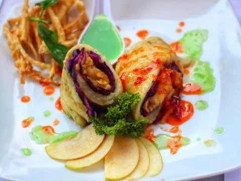 Delicious Apple Spring Roll Snack with Fresh Apple Sauce Stock Photos