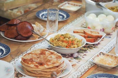 Delicious array of traditional dishes on a dining table Stock Photos