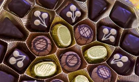 Delicious assorted chocolates presented on a decorative platter at a festiv.. Stock Photos