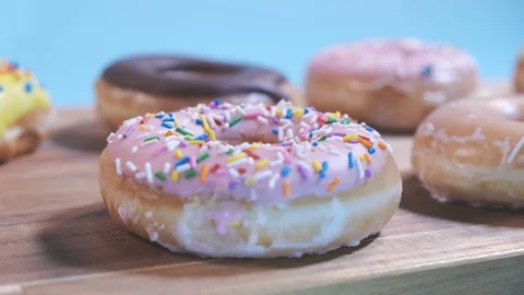 Delicious Assorted Donuts Stop Motion 4K Stock Footage 125412022