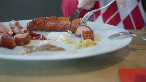 Delicious Assorted Sausages on a Plate Stock Footage 327973956