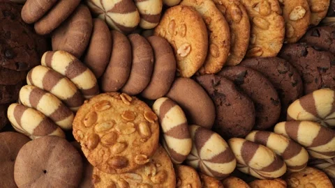 Delicious assortment of chocolate and vanilla cookies Stock Footage 344898114