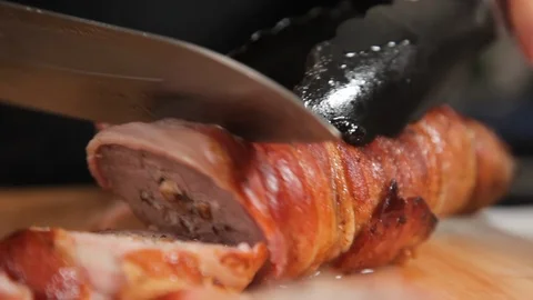 Delicious bacon wrapped meat Video stock 88859236