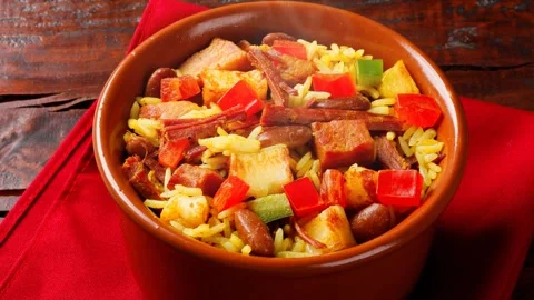 Delicious Baio de Dois served in a clay pot with curd cheese and sun dried Video stock 334354219