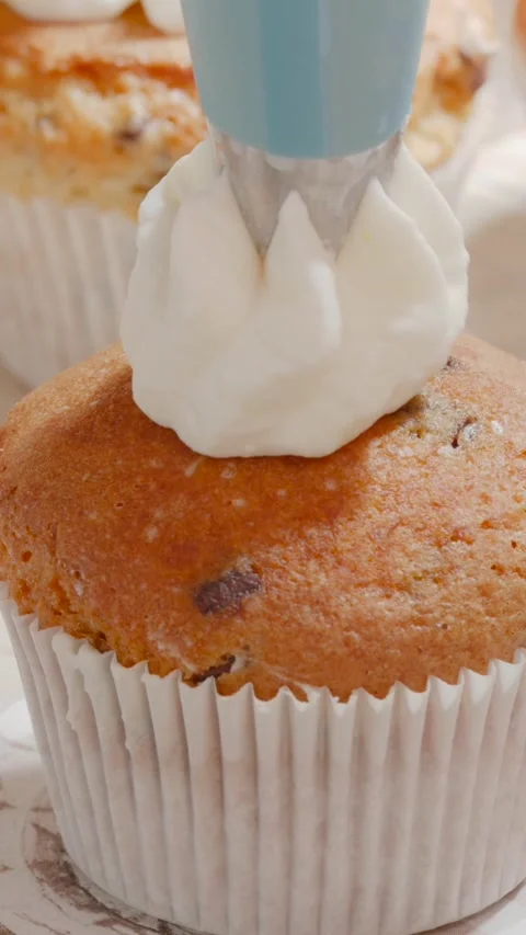 Delicious baked muffins with chocolate chips in a cozy kitchen setting Stock Footage 319049157