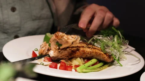 Delicious baked salmon with vegetables - simple recipe. Stock Footage 276592610