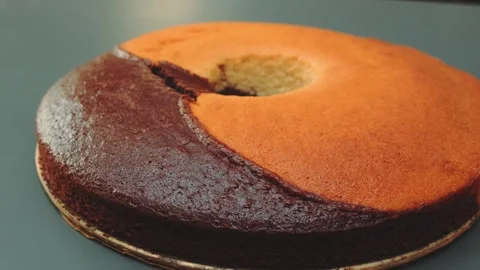 Delicious baked two-tone cake with a crispy crust Stock-Footage 252348211