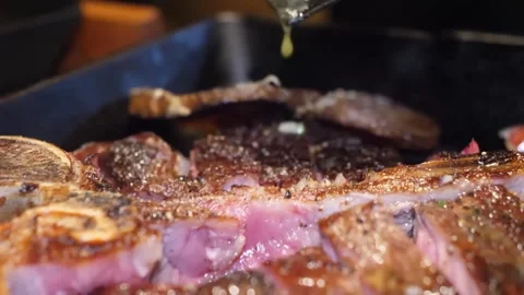 Delicious Beef Steak Sizzling on a Hot Grill, Close-Up View 스톡 동영상 332817446