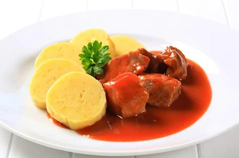 Delicious beef stew with mashed potatoes on plate Stock Photos