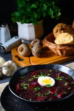 Delicious beetroot borscht with egg Stock Photos