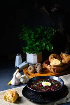 Delicious beetroot borscht with egg Stock Photos