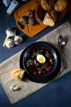 Delicious beetroot borscht with egg Stock Photos