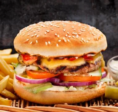 Delicious big burger Stock Photos