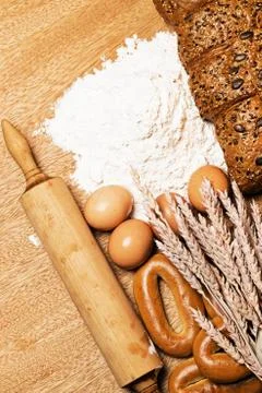 Delicious bread, bagels and eggs on the table Stock Photos