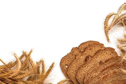 Delicious bread. Fresh loaf of rustic traditional bread with wheat grain ear  Stock Photos