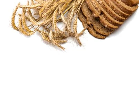 Delicious bread. Fresh loaf of rustic traditional bread with wheat grain ear  Stock Photos