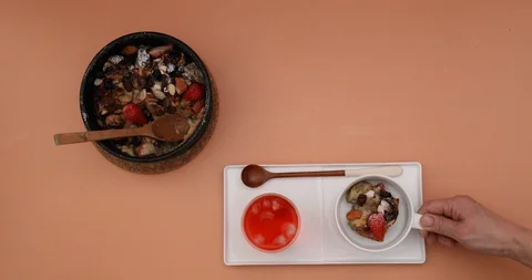 Delicious bread pudding with red tea on table Stock Footage 128863220