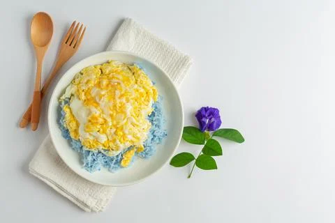 Delicious breakfast scrambled eggs in white plate and clean white background Stock Photos