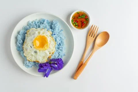 Delicious breakfast scrambled eggs in white plate and clean white background Stock Photos