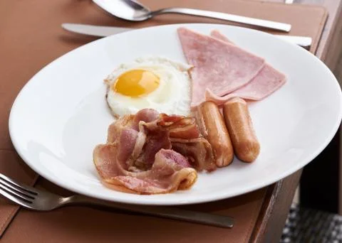 Delicious breakfast on the table in restaurant. Stock Photos
